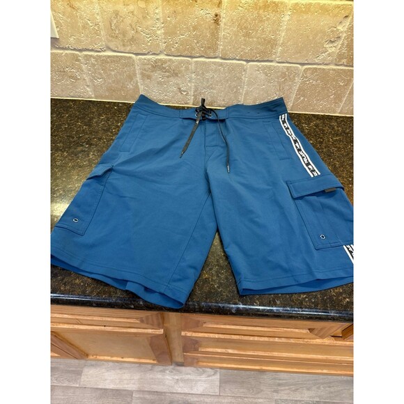 Pelagic Blackfin Stretch Board Shorts Blue Size 34 NWOT - Picture 2 of 6